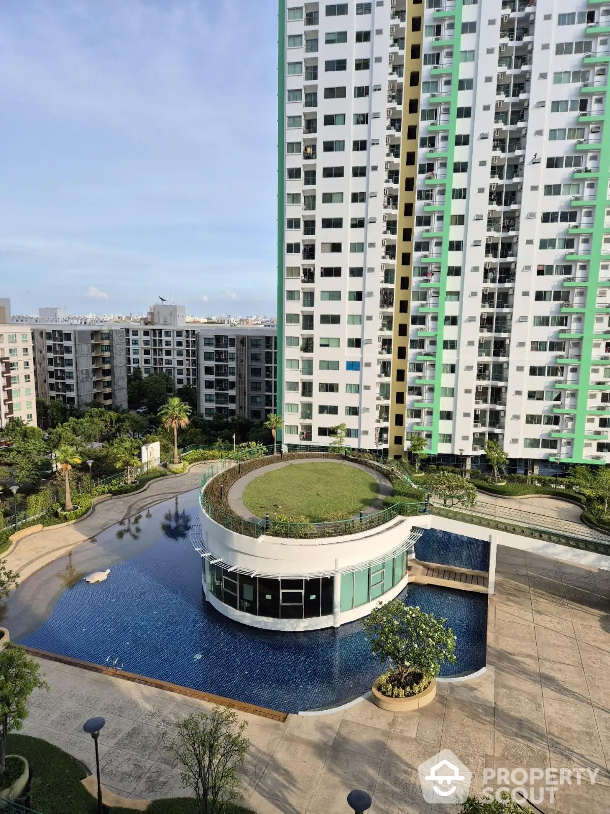 Modern high-rise apartment with pool and rooftop garden view