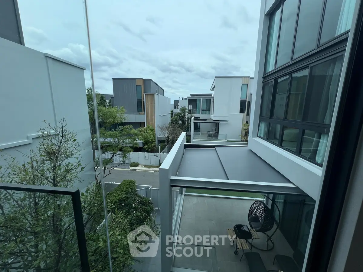Modern residential complex with sleek architecture and spacious balconies, offering a serene and stylish living environment.
