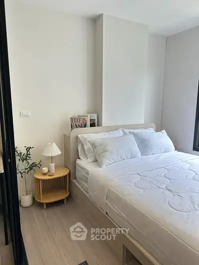 Cozy and modern bedroom with stylish decor and natural light