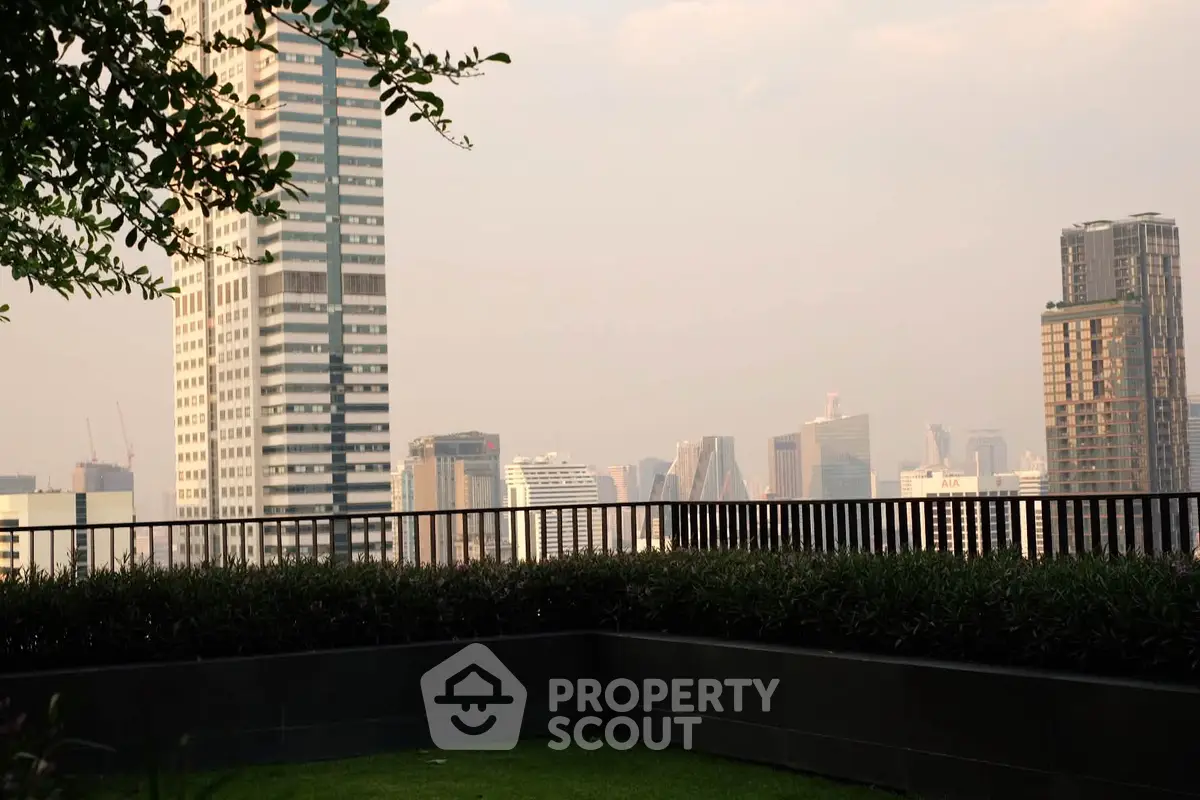 Stunning cityscape view from a lush rooftop garden in a modern urban setting.