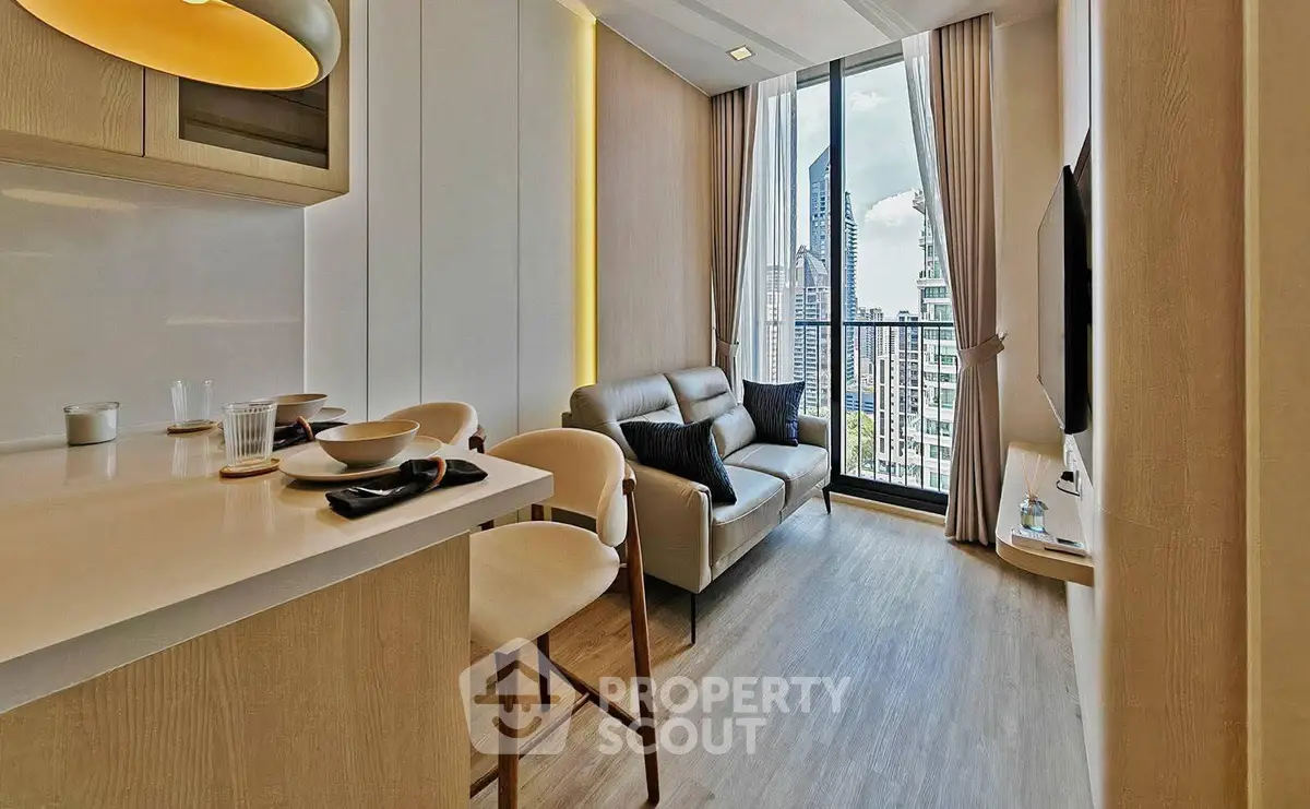 Modern living room with city view, stylish furniture, and open layout in high-rise apartment.