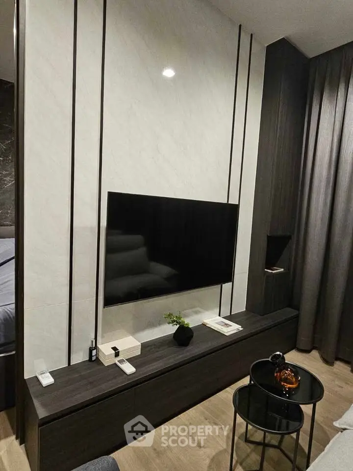 Modern living room with sleek TV setup and stylish decor