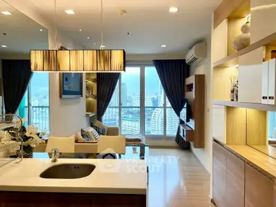 Modern open-layout living room with city view and stylish lighting
