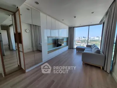 Spacious modern living room with panoramic city view and sleek design