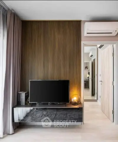 Modern living room with stylish TV stand and elegant decor