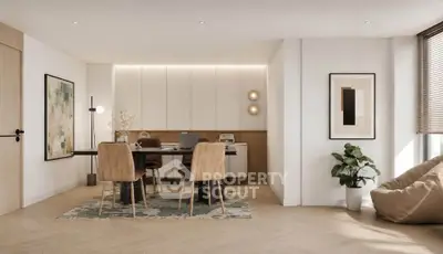 Modern living room with stylish decor, featuring a cozy seating area and elegant artwork.