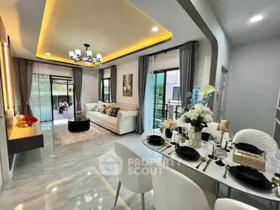 Luxurious modern living room with elegant dining area, featuring stylish decor and ample natural light.