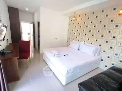 Modern bedroom with stylish decor and comfortable furnishings