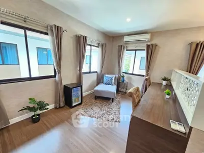 Spacious and bright living room with modern decor and large windows