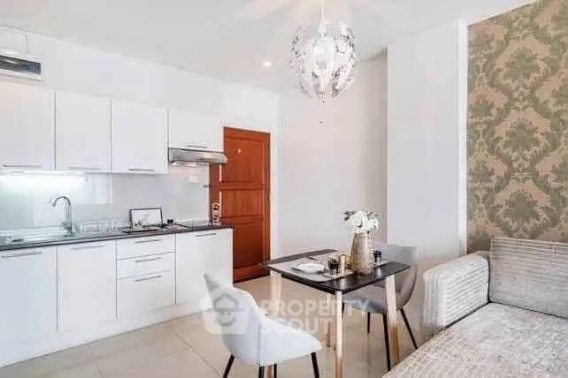 Modern kitchen and dining area with stylish decor and open layout