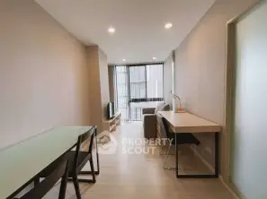 Modern living room with sleek furniture and natural light