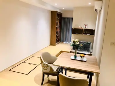 Modern minimalist living room with cozy dining area and stylish decor
