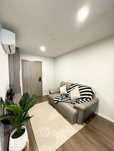 Modern living room with sleek sofa and stylish decor