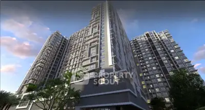 Modern high-rise residential building with sleek architecture and lush greenery.