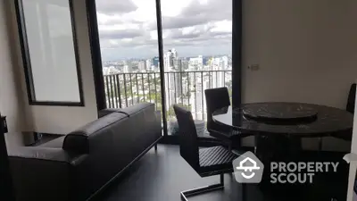 Luxurious high-rise apartment with stunning city view and elegant interior design.