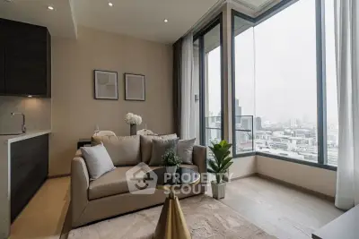 Modern living room with city view, featuring elegant decor and large windows for natural light.