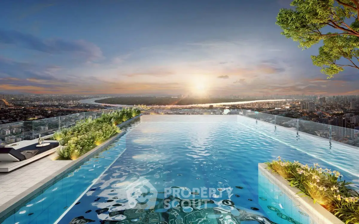 Stunning rooftop infinity pool with breathtaking city skyline and sunset view.