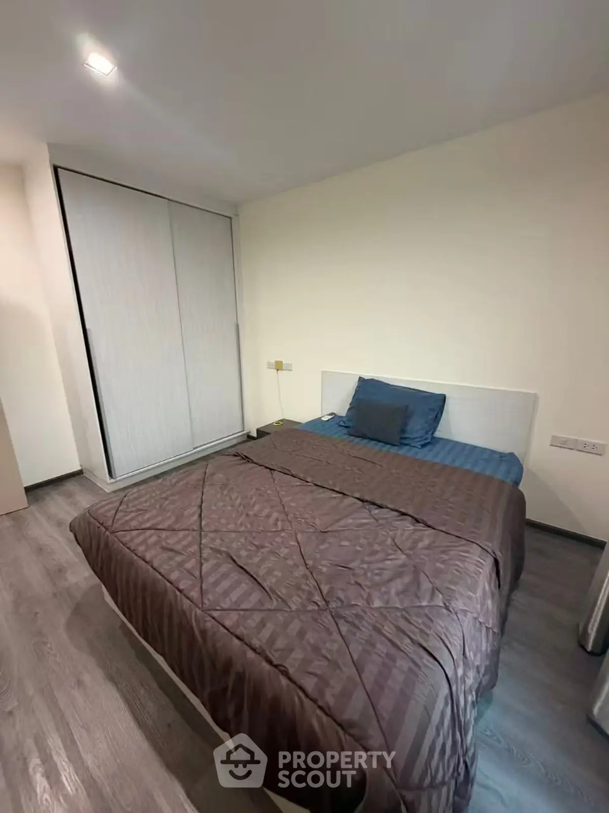 Cozy bedroom with modern design and ample storage space