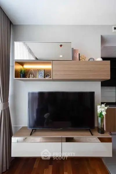 Modern living room with sleek TV unit and stylish decor
