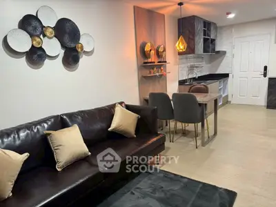 Modern living room with stylish decor and open kitchen layout