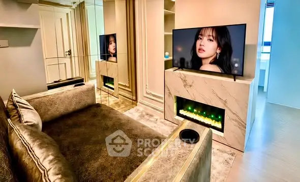 Luxurious living room with elegant sofa, modern TV setup, and stylish decor in a contemporary apartment.