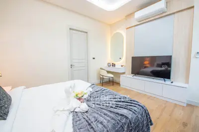 Modern bedroom with stylish decor and cozy ambiance