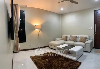 Cozy modern living room with plush sofa and stylish decor