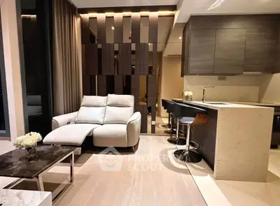 Modern living room with stylish open kitchen and cozy seating area