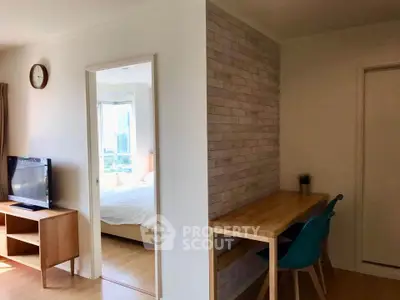Modern apartment interior with cozy bedroom and stylish study area