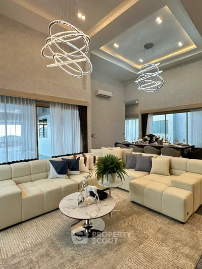 Luxurious modern living room with elegant lighting and plush seating