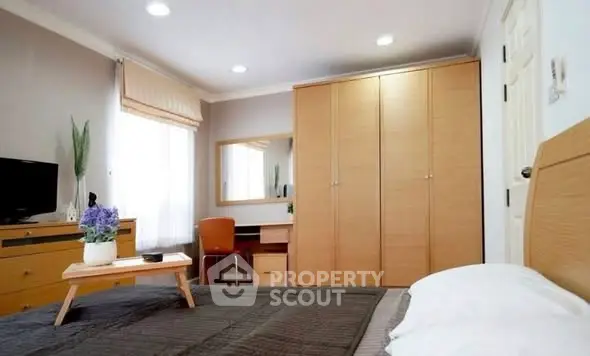 Cozy bedroom with modern furniture and natural light