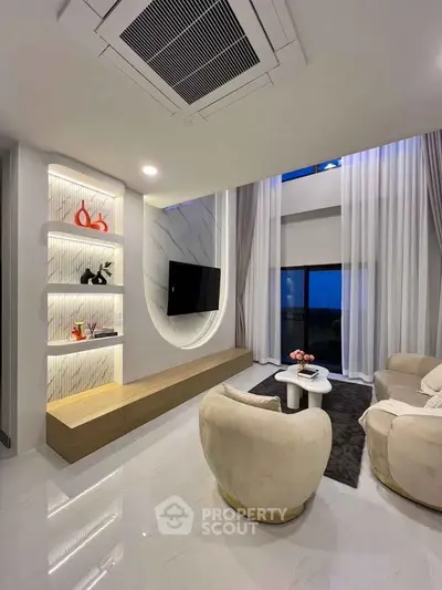 Luxurious modern living room with high ceilings and elegant decor