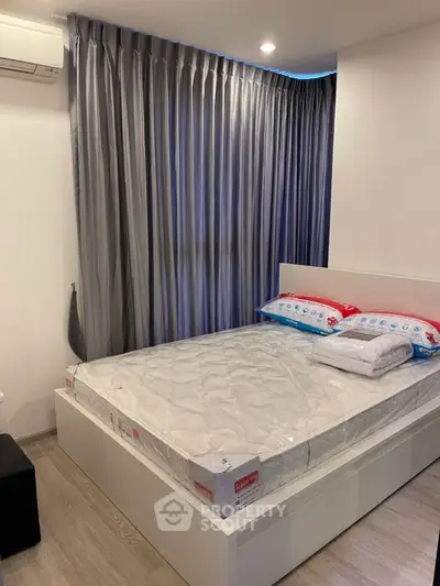 Modern bedroom with sleek design and cozy ambiance