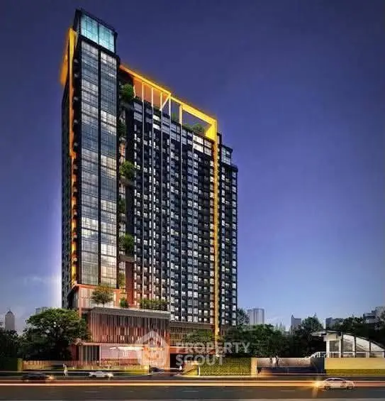 Stunning modern high-rise building with illuminated facade and lush greenery, perfect for urban living.