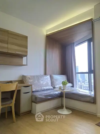 Modern living room with city view, cozy seating, and stylish wooden accents.