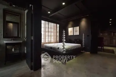 Luxurious modern bedroom with unique design and ambient lighting