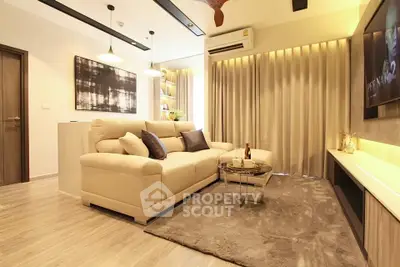 Modern living room with cozy beige sofa and stylish decor