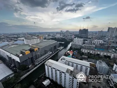 Stunning cityscape view from high-rise building with river and skyline