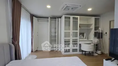 Modern bedroom with open closet and stylish furniture