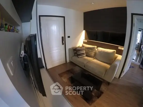 Cozy modern living room with plush sofa and sleek decor