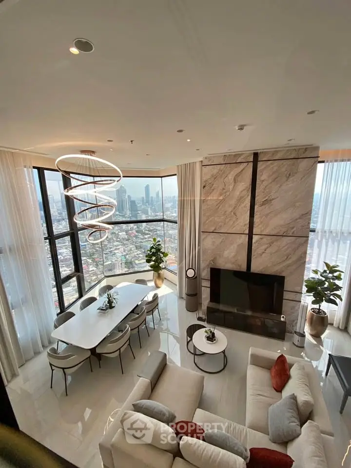 Luxurious high-rise living room with stunning city views and modern decor