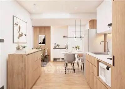 Modern open-layout kitchen and dining area with stylish wooden cabinetry and elegant decor.