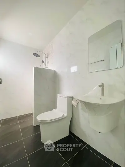 Modern bathroom with sleek fixtures and elegant tile design