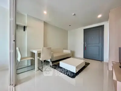 Modern living room with sleek furniture and neutral tones, perfect for urban living.