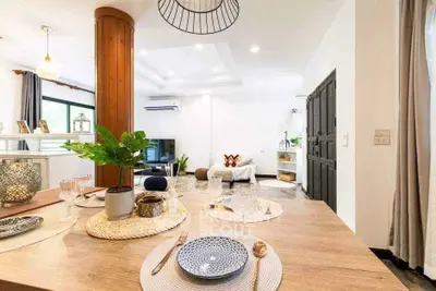 Spacious modern living room with elegant dining area and stylish decor