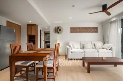 Spacious modern living room with wooden furniture and elegant decor