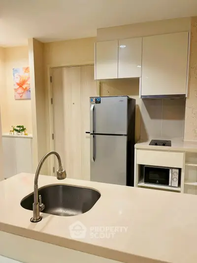Modern kitchen with sleek appliances and stylish design