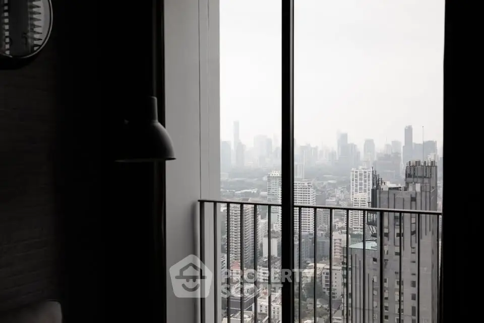 Stunning cityscape view from a modern apartment balcony, showcasing urban skyline.