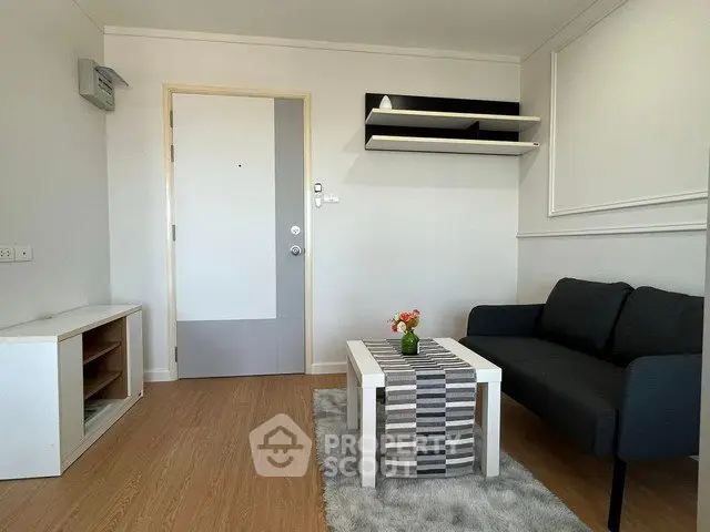 Modern living room with sleek furniture and stylish decor