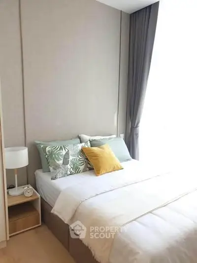 Bright and cozy bedroom with modern decor and natural light